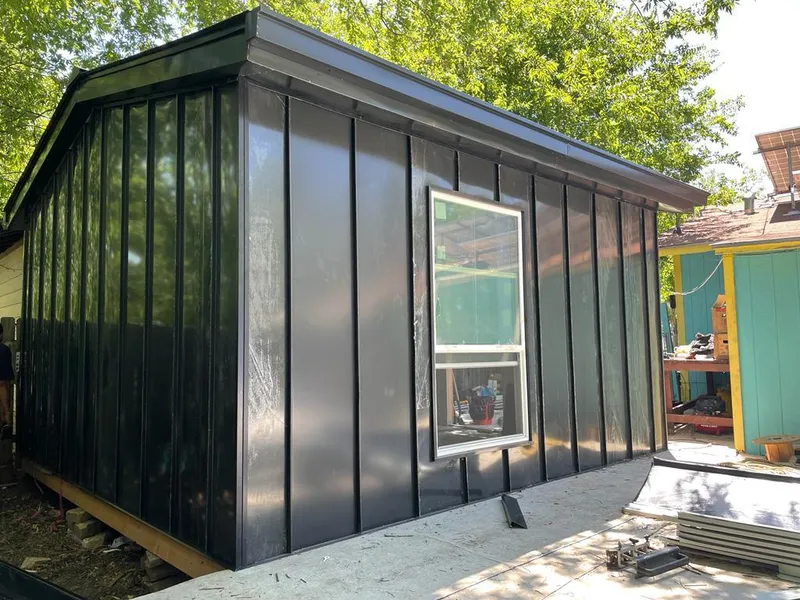 Black standing seam metal wall panels for Metal Roof Installation in South Hill