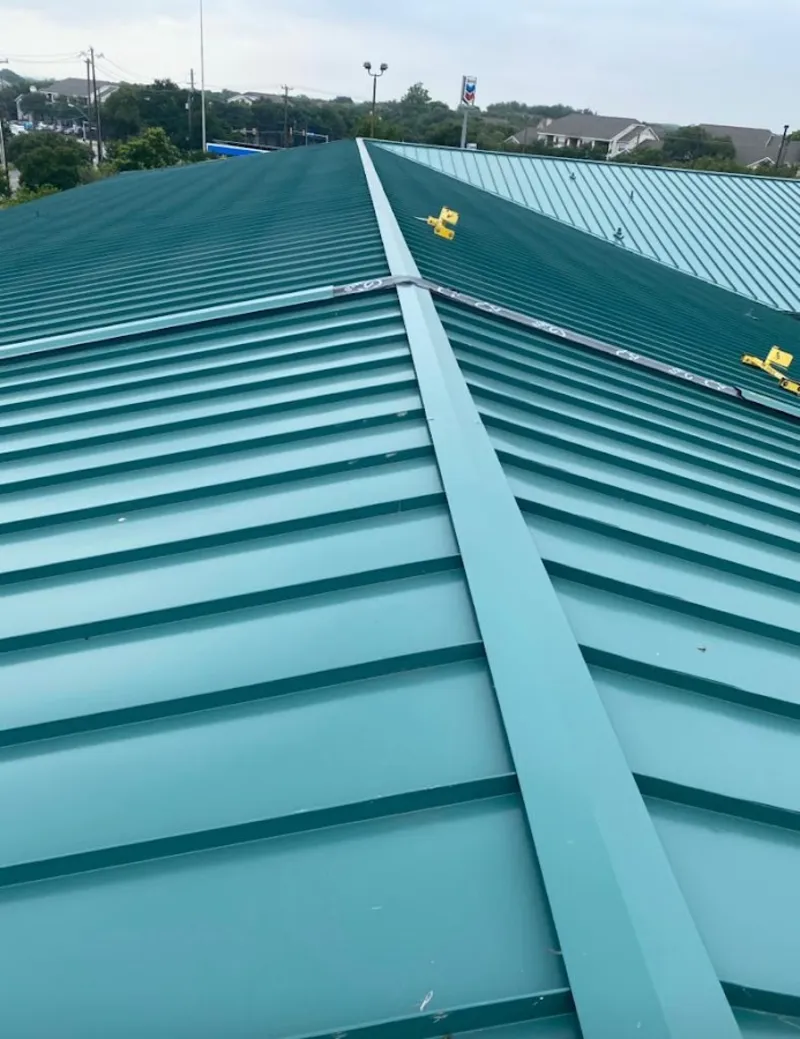 Green commercial metal roof ridge and valley for Metal Roof Repair in South Hill