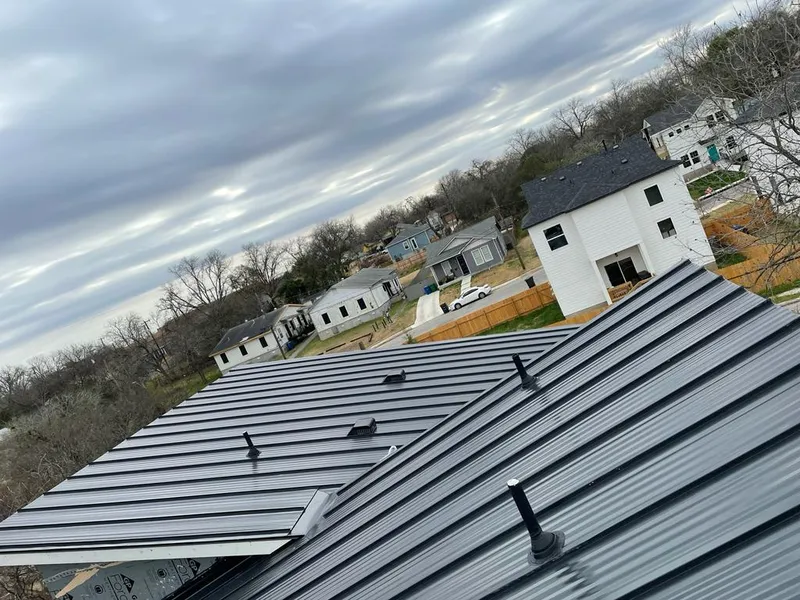 Standing seam metal roof panels with vents for Skylight Repair in South Hill